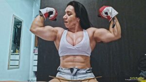 Karla Bachiega destroys chains and metal bar