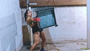 Karla Lifts and Destroys a Metal Stove