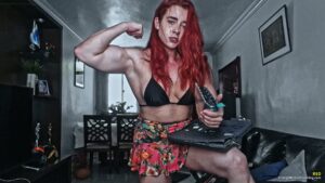 Red rips notebook apart using her muscles