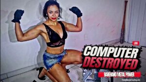Lidia destroys a computer with her strength
