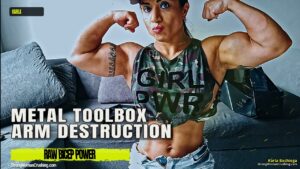 Karla uses her Big Arms to turn a metal toolbox into scrap metal