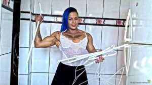 Tai destroys a metal cloth stand
