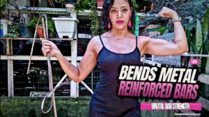 Lidia beauty bends metal bars