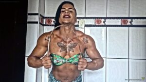 Tai bends some metal bars for fun