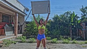 Glauce lifts and destroys a washing machine