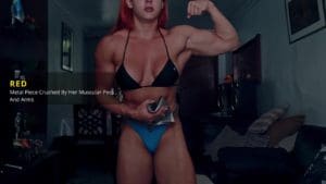 RED metal piece crushed by her muscular pecs and arms