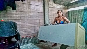 Thata Ogra Curling and Destroying a Refrigerator
