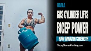 Karla Bachiega uses a gas cylinder as weight