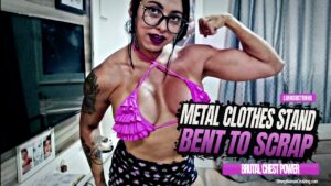 Luh Monstrinha smashes a metal clothstanding