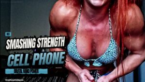 RED in blue bikini enjoys smashing a cellphone