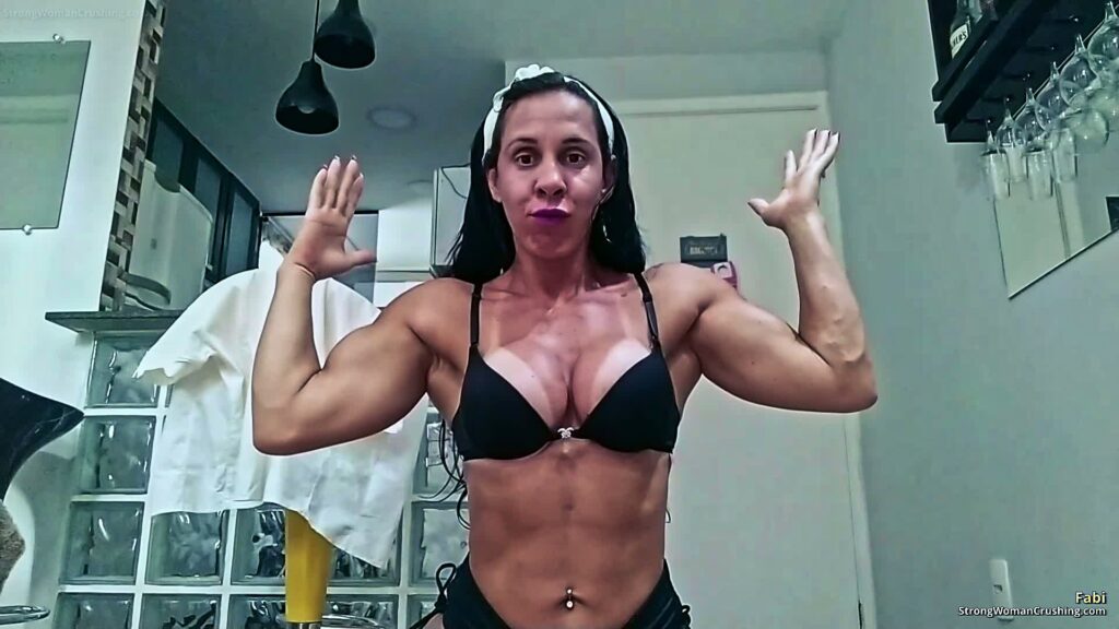 Fabi flex her muscles and bursts from her shirt