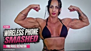 Gil Cunha smashes a wireless telephone