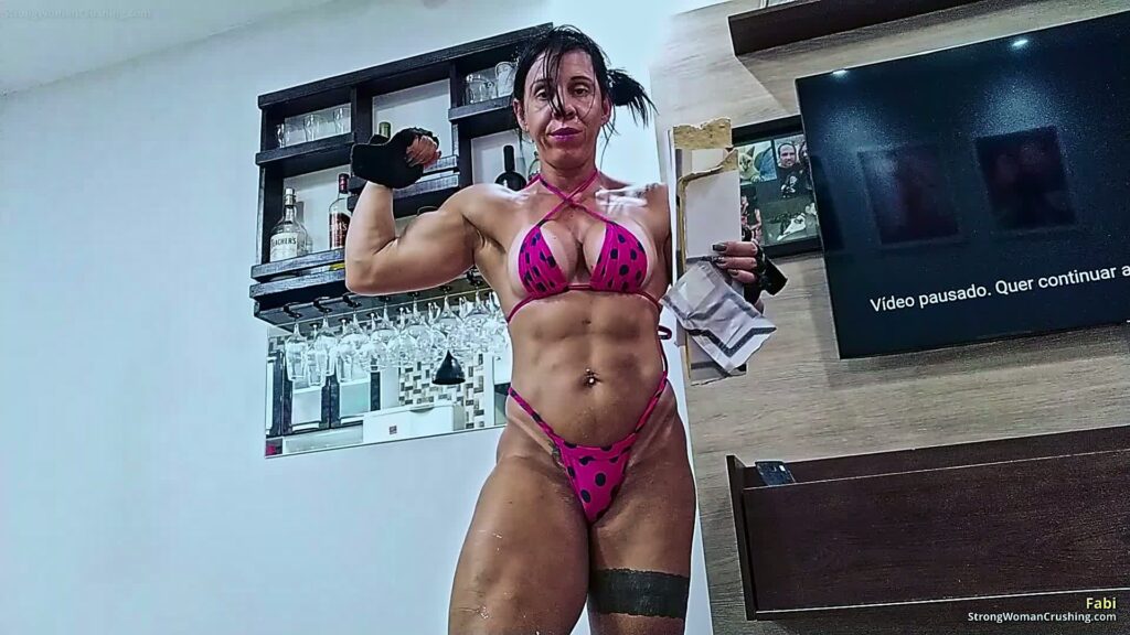 Fabi uses her muscle and breaks some woods