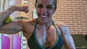 Tatiana squeezes a lemon with her strength