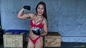 Glauce smashes a pan in her red bikini
