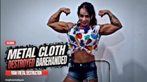 Gil Cunha destroys a metal cloth standing