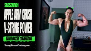 Sassenach smashes an apple in a V-string bikini