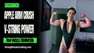Sassenach smashes an apple in a V-string bikini