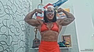 Marta Strong thrashes your Christmas toys with her muscular arms
