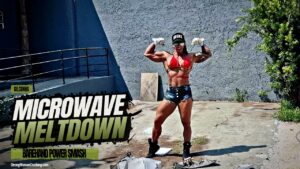 Gil Cunha shows her super strength and muscles by smashing a poor microwave into pieces