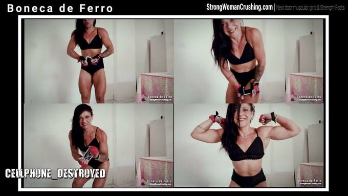 Boneca de Ferro shows her muscles and displays her power by crushing a mobile cellphone into pieces