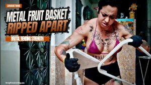 Luh Monstrinha shows her muscular brute force and destroys a metal fruit basket