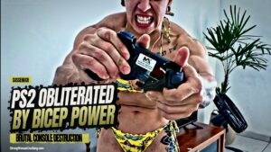 Sassenach uses her immense biceps and smashes an old PlayStation 2 into pieces