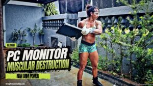 Gil Cunha trashes an old pc monitor using her gigantic muscular arms and strength
