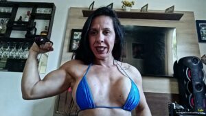 Fabi Shows Off Her Strength with Can Crushing Feats