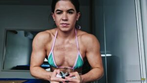 Incredible Female Power: Jhey Bursts Soda Cans with Her Muscles