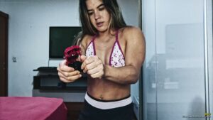 Jhey Crush a Red Metal Toy Car with her Muscular Strength