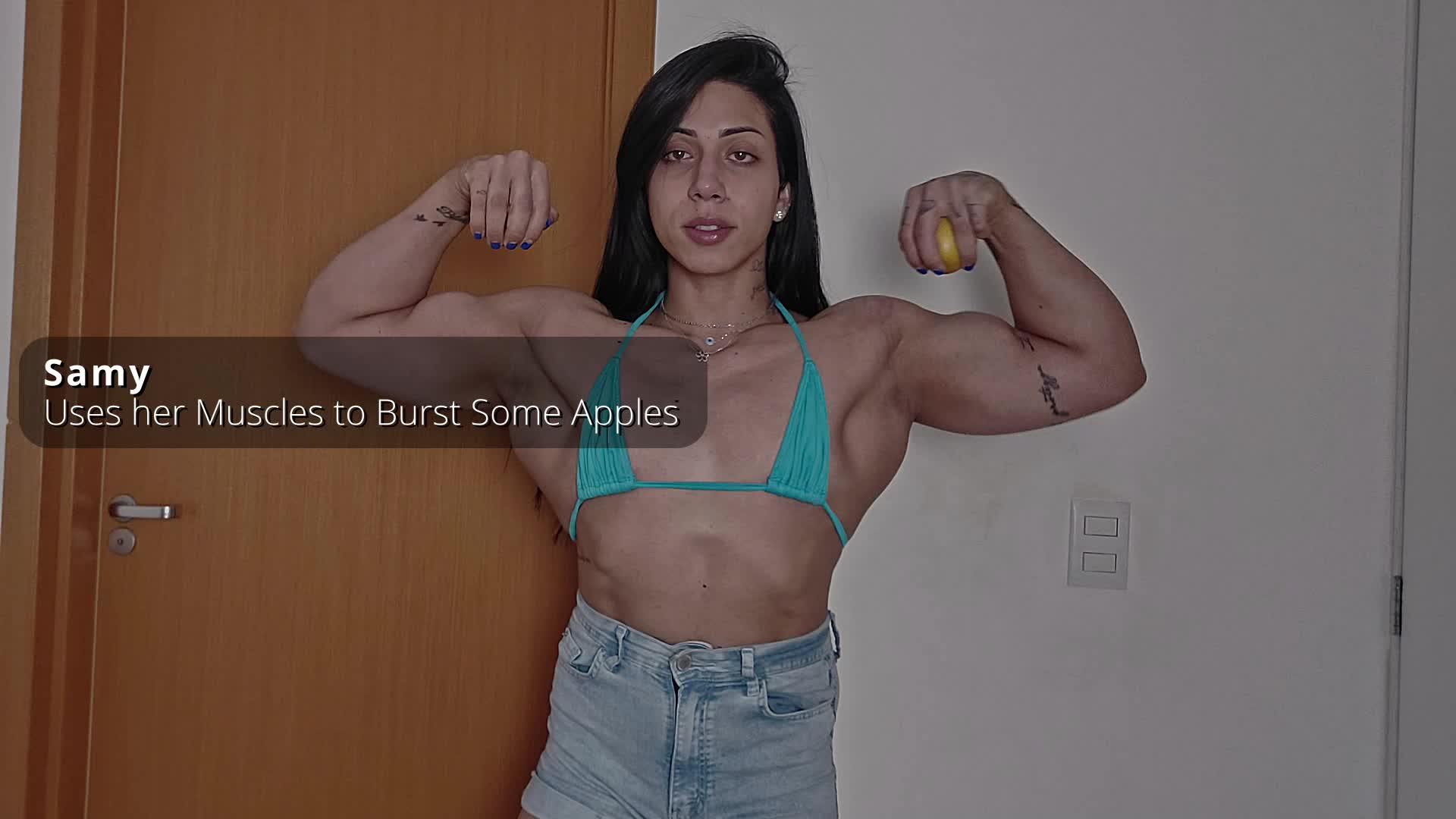 Samy Uses Her Muscle to Burst Some Apples