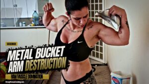 Sassenach destroys a metal bucket in her muscular arms