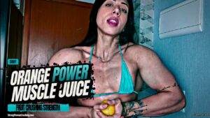 Samy shows her super strong muscles smashing oranges