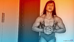 Samy squeezes metal bucket in her muscles