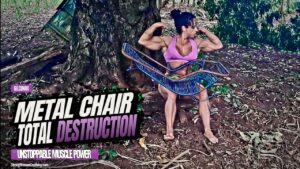 Gil Cunha destroys an old metal chair