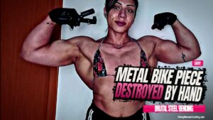 Samy destroys a metal bike piece