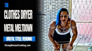 Tai smashes a metal cloth dryer