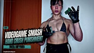 Samy smashes a videogame in her hands