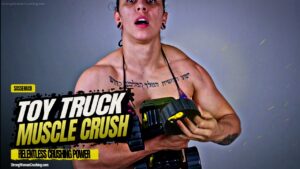 Sassenach smashes a toy truck against her muscles
