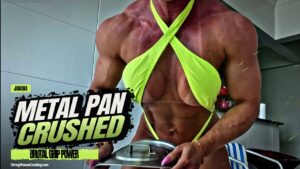 Janaina destroys a metal frying pan