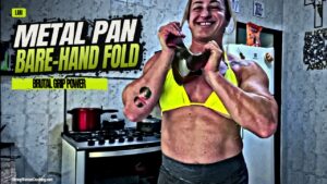 Lari Folds a Metal Pan With Her Bare Hands