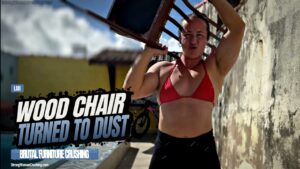 Lari destroys a wood chair