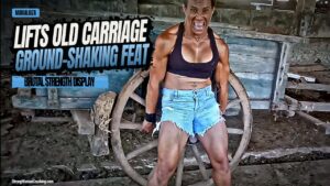 Maria Luiza lifts a big carriage